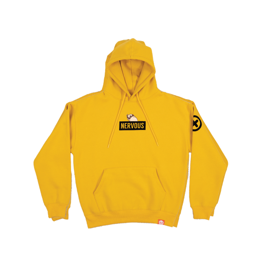 A yellow hoodie with a graphic of a scared-looking pug above a black rectangle with the yellow text "NERVOUS". The graphic is in the centre of the chest of the hoodie. There is a black X with a black circle around it on the top-left of one of the the sleeves. There is a small red tag on the bottom hem of the hoodie.